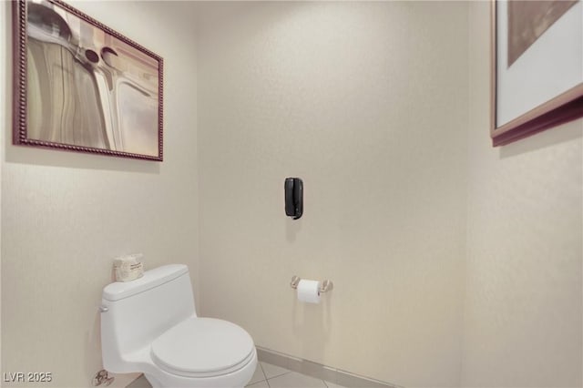 135 E Harmon Ave Unit 315, Las Vegas, NV 89109 - half bathroom with toilet and tile patterned flooring