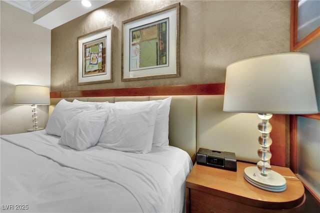 135 E Harmon Ave Unit 315, Las Vegas, NV 89109 - bedroom featuring crown molding