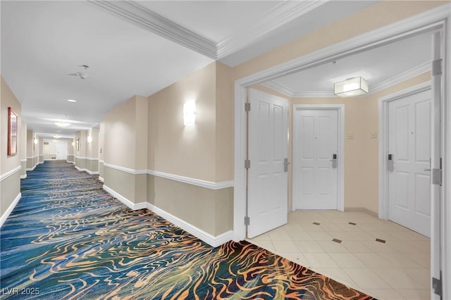 135 E Harmon Ave Unit 315, Las Vegas, NV 89109 - hallway with baseboards, carpet floors, ornamental molding, and tile patterned floors
