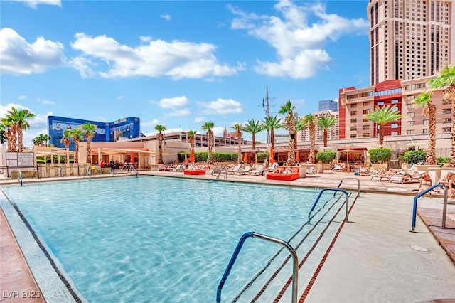 135 E Harmon Ave Unit 315, Las Vegas, NV 89109 - community pool with a patio
