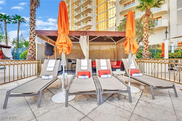 135 E Harmon Ave Unit 315, Las Vegas, NV 89109 - view of patio / terrace with outdoor dining space and a gazebo