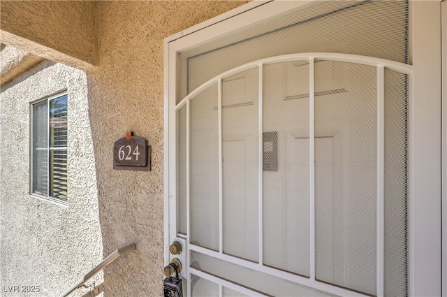 6480 Annie Oakley Dr Unit 624, Las Vegas, NV 89120 - property entrance with stucco siding