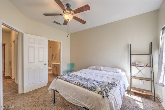 6480 Annie Oakley Dr Unit 624, Las Vegas, NV 89120 - bedroom with carpet floors, ensuite bathroom, and ceiling fan