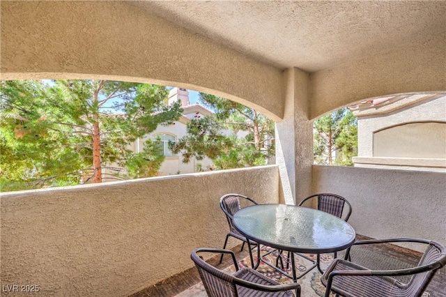 6480 Annie Oakley Dr Unit 624, Las Vegas, NV 89120 - balcony with outdoor dining area