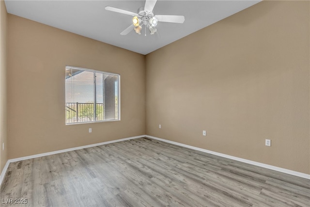 3544 Desert Cliff St Unit 102, Las Vegas, NV 89129 - empty room featuring wood finished floors and baseboards