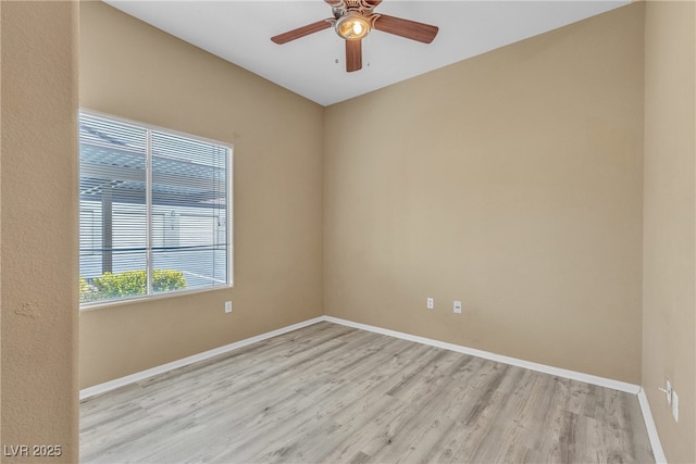 3544 Desert Cliff St Unit 102, Las Vegas, NV 89129 - spare room with light wood-style flooring, a ceiling fan, and baseboards
