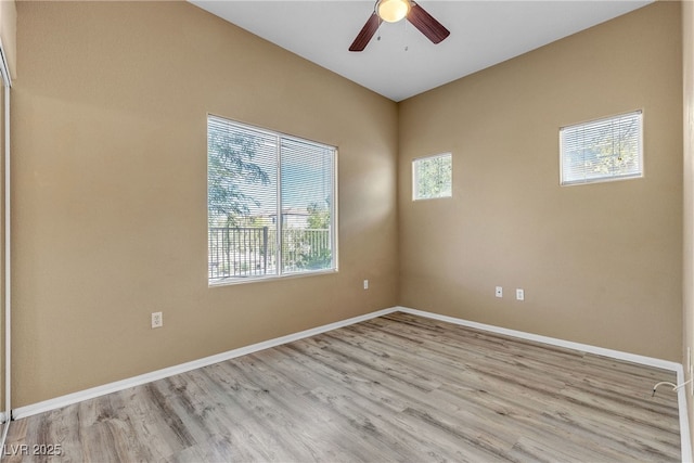 3544 Desert Cliff St Unit 102, Las Vegas, NV 89129 - unfurnished room featuring wood finished floors, a ceiling fan, and baseboards
