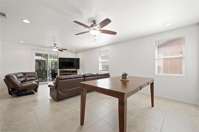 9104 Ashiwi Ave, Las Vegas, NV 89178 - living room with recessed lighting, a ceiling fan, light tile patterned flooring, and baseboards