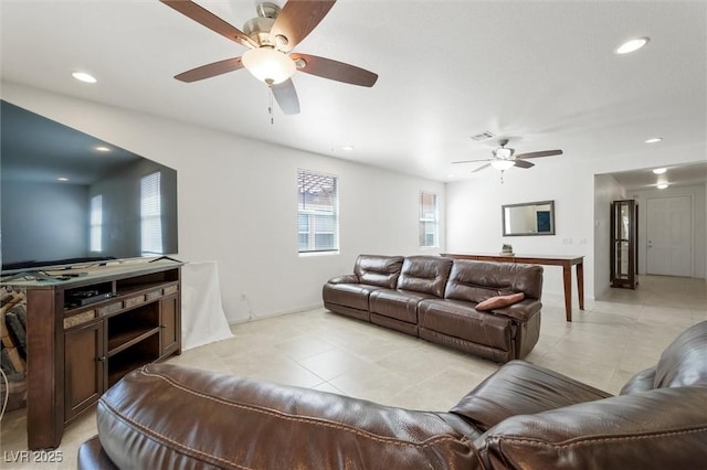 9104 Ashiwi Ave, Las Vegas, NV 89178 - living room with a ceiling fan, light tile patterned floors, and recessed lighting