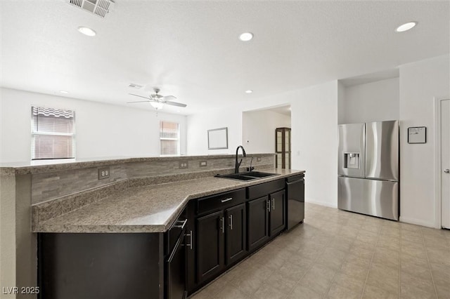 9104 Ashiwi Ave, Las Vegas, NV 89178 - kitchen featuring stainless steel refrigerator with ice dispenser, a sink, dishwasher, ceiling fan, and recessed lighting