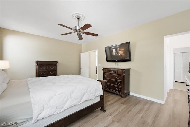 9104 Ashiwi Ave, Las Vegas, NV 89178 - bedroom with light wood-style flooring, baseboards, and ceiling fan