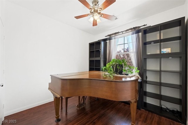 9104 Ashiwi Ave, Las Vegas, NV 89178 - home office with baseboards, wood finished floors, and a ceiling fan