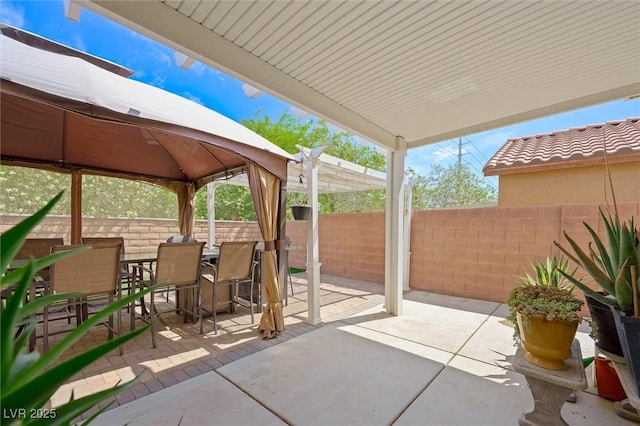 9104 Ashiwi Ave, Las Vegas, NV 89178 - view of patio featuring outdoor dining space and a gazebo