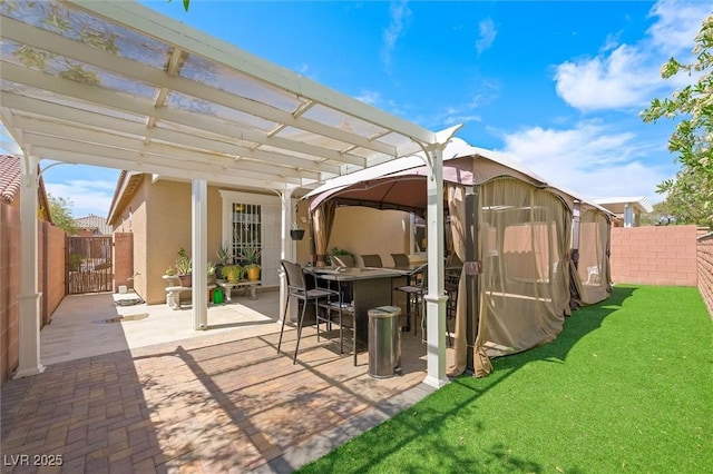 9104 Ashiwi Ave, Las Vegas, NV 89178 - view of patio with a pergola and a gate