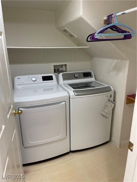 5334 Floating Flower Ave, Las Vegas, NV 89139 - laundry area featuring independent washer and dryer and light floors