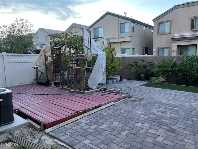 5334 Floating Flower Ave, Las Vegas, NV 89139 - wooden deck featuring a fenced backyard, a patio area, and central AC unit