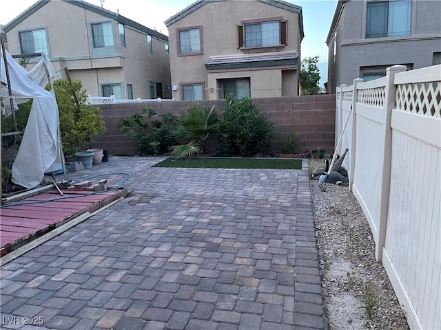 5334 Floating Flower Ave, Las Vegas, NV 89139 - fenced backyard with a patio