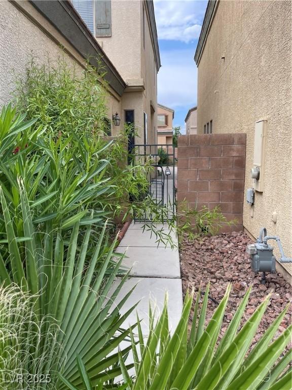 5334 Floating Flower Ave, Las Vegas, NV 89139 - view of yard featuring a gate