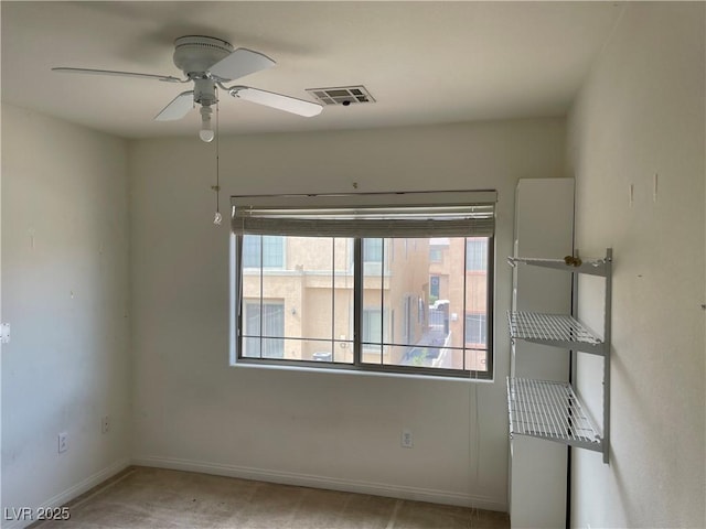 5334 Floating Flower Ave, Las Vegas, NV 89139 - spare room featuring baseboards, a ceiling fan, and carpet