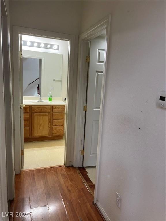 5334 Floating Flower Ave, Las Vegas, NV 89139 - hallway with light wood finished floors and baseboards