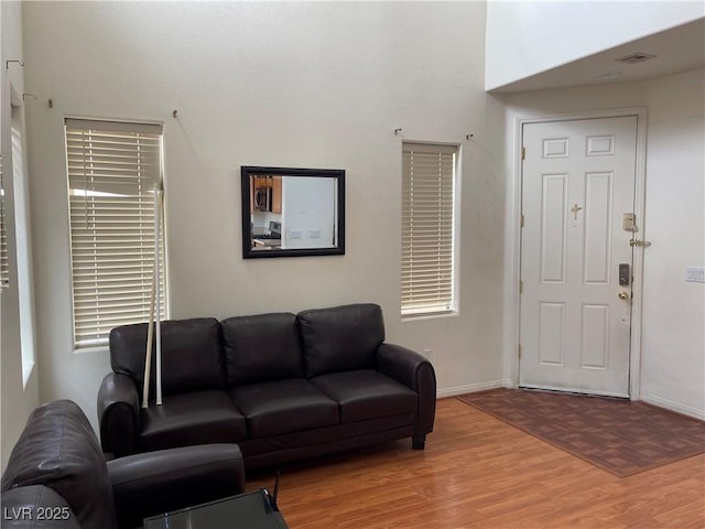 5334 Floating Flower Ave, Las Vegas, NV 89139 - living room featuring wood finished floors and baseboards