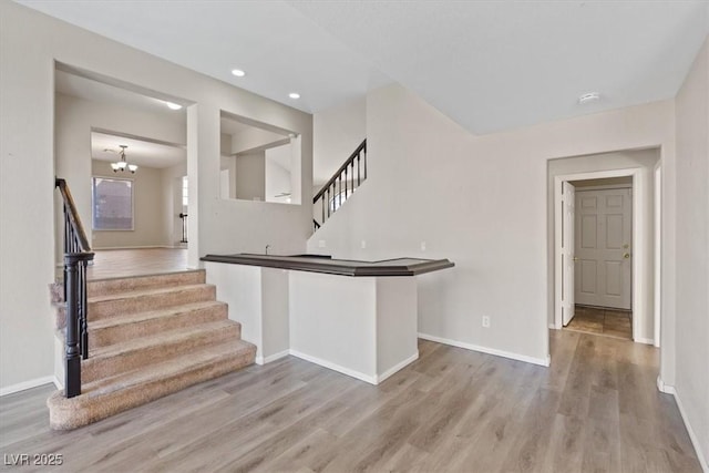 2812 Via Avanti St, Henderson, NV 89074 - kitchen featuring wood finished floors, baseboards, a chandelier, and recessed lighting