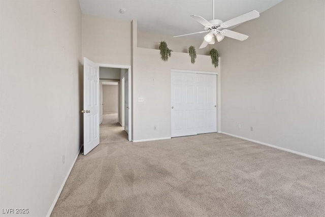 2812 Via Avanti St, Henderson, NV 89074 - unfurnished bedroom with carpet, a towering ceiling, baseboards, and ceiling fan