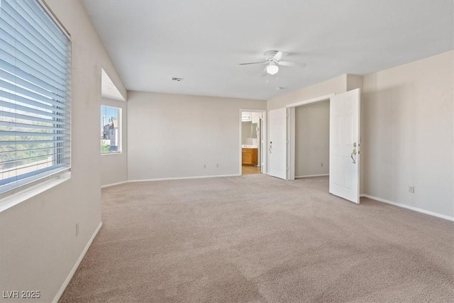 2812 Via Avanti St, Henderson, NV 89074 - empty room featuring a ceiling fan, light carpet, and baseboards