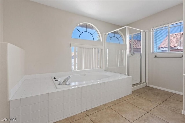 2812 Via Avanti St, Henderson, NV 89074 - bathroom featuring plenty of natural light, a garden tub, a stall shower, and tile patterned floors
