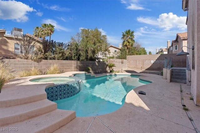 2812 Via Avanti St, Henderson, NV 89074 - view of swimming pool with a fenced backyard, a patio area, and a pool with connected hot tub