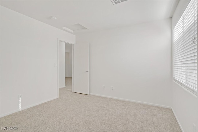 9535 Stills Way, Las Vegas, NV 89148 - spare room featuring light carpet, healthy amount of natural light, and baseboards