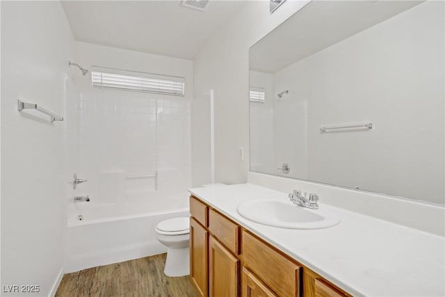 9535 Stills Way, Las Vegas, NV 89148 - bathroom with vanity, toilet, wood finished floors, and bathing tub / shower combination