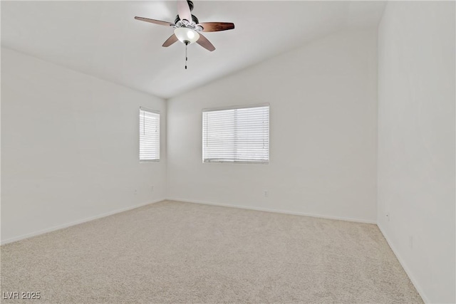 9535 Stills Way, Las Vegas, NV 89148 - spare room featuring vaulted ceiling, light colored carpet, a ceiling fan, and baseboards