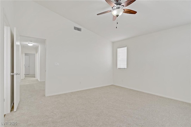 9535 Stills Way, Las Vegas, NV 89148 - empty room featuring light carpet, a ceiling fan, vaulted ceiling, and baseboards