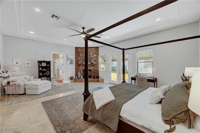 2111 Bogart Ct, Las Vegas, NV 89117 - bedroom featuring recessed lighting, access to exterior, a raised ceiling, a ceiling fan, and french doors