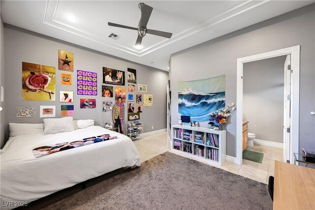 2111 Bogart Ct, Las Vegas, NV 89117 - bedroom with a raised ceiling, ensuite bath, recessed lighting, ceiling fan, and baseboards