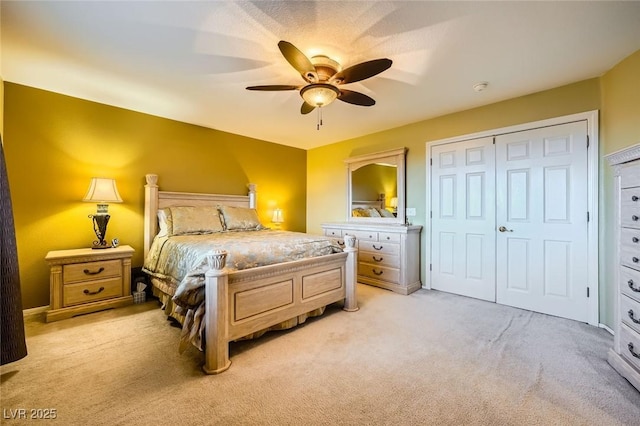 3412 Crystal Tower St, Las Vegas, NV 89129 - bedroom featuring light colored carpet, a ceiling fan, and a closet