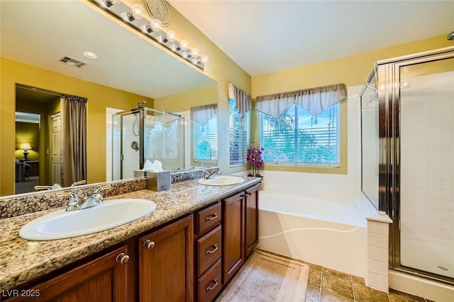 3412 Crystal Tower St, Las Vegas, NV 89129 - bathroom with a shower stall, a bath, and double vanity