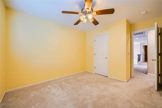 3412 Crystal Tower St, Las Vegas, NV 89129 - unfurnished bedroom with light carpet, baseboards, and ceiling fan