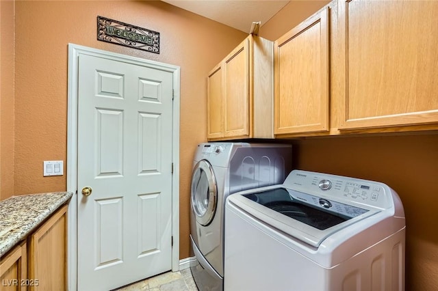 3412 Crystal Tower St, Las Vegas, NV 89129 - washroom with cabinet space, washing machine and dryer, and a textured wall