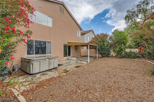 3412 Crystal Tower St, Las Vegas, NV 89129 - back of house with a hot tub, stucco siding, a patio area, and a fenced backyard