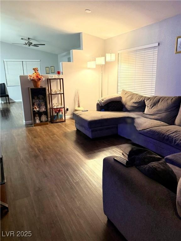 1367 Sun Pillars Ave, Henderson, NV 89014 - living area with wood finished floors, a ceiling fan, and lofted ceiling
