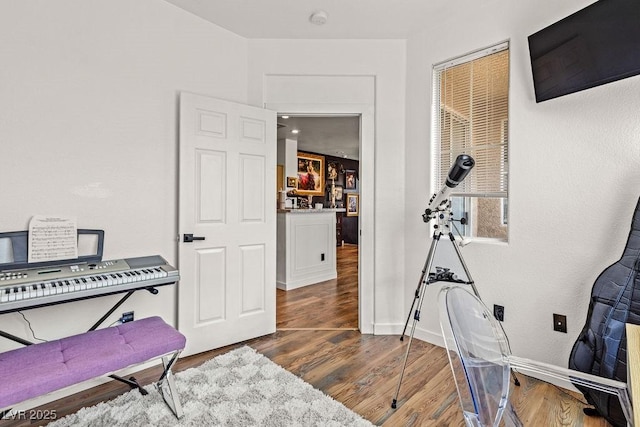 10180 Delray Beach Ave Unit 202, Las Vegas, NV 89129 - home office with wood finished floors and baseboards