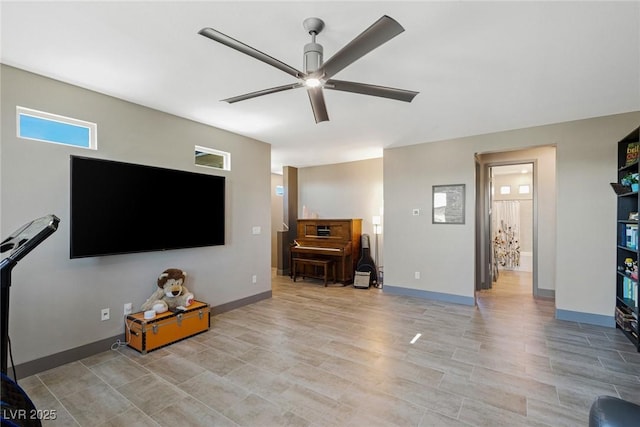 4290 Solace St, Las Vegas, NV 89135 - living area featuring a ceiling fan and baseboards