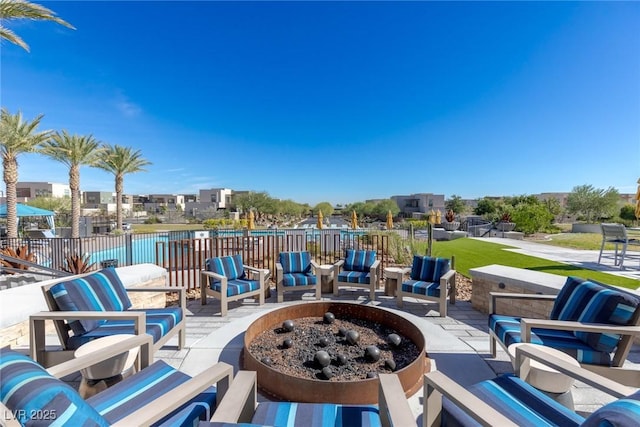 4290 Solace St, Las Vegas, NV 89135 - view of patio / terrace featuring an outdoor living space with a fire pit