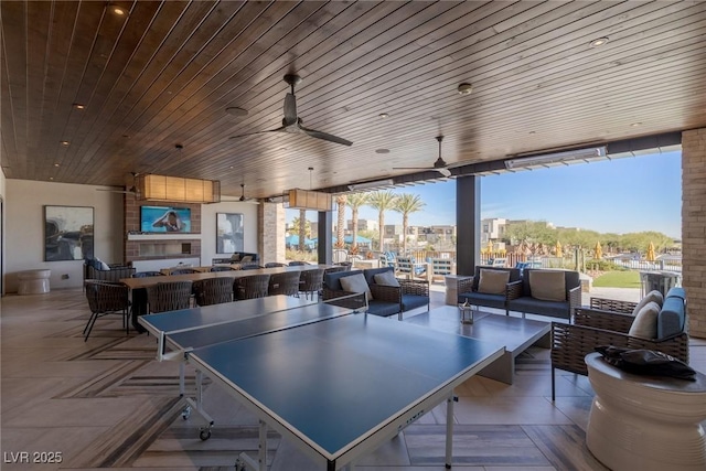 4290 Solace St, Las Vegas, NV 89135 - view of patio with outdoor dining area, ceiling fan, and an outdoor living space