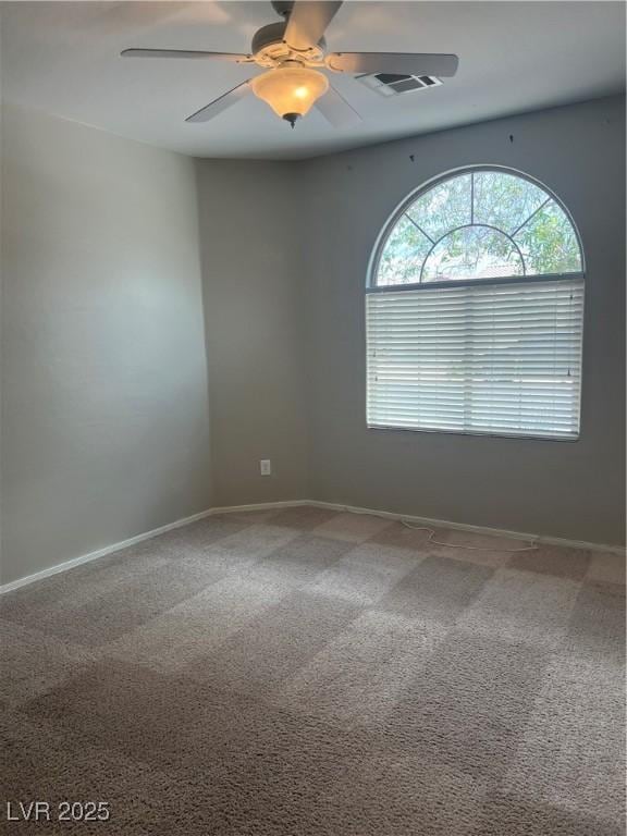 6092 Fox Creek Ave, Las Vegas, NV 89122 - empty room with ceiling fan, baseboards, and carpet flooring