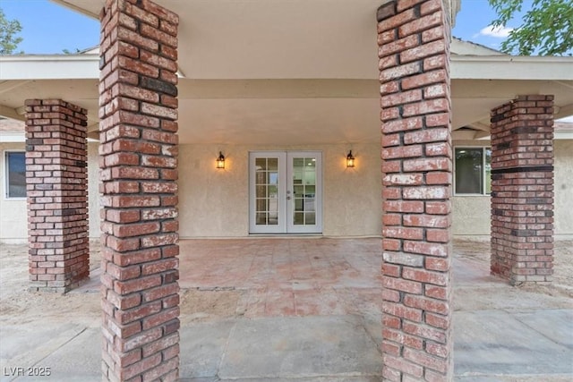 4805 Jay Ave, Las Vegas, NV 89130 - entrance to property with french doors, stucco siding, and brick siding