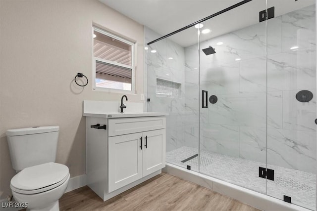 4805 Jay Ave, Las Vegas, NV 89130 - bathroom with wood finished floors, toilet, vanity, and a marble finish shower