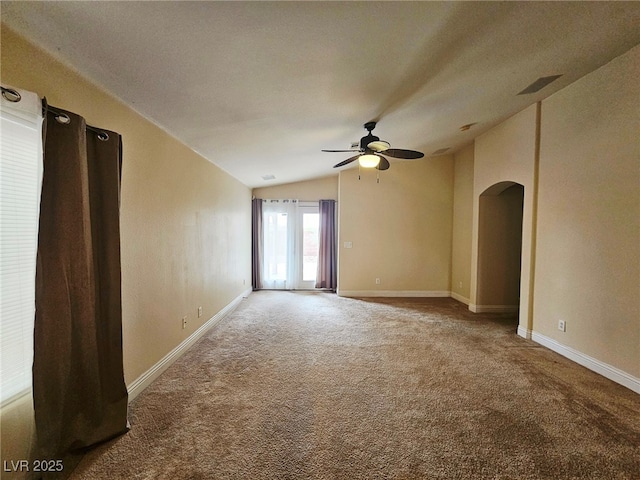 9462 Alhambra Valley St, Las Vegas, NV 89178 - carpeted empty room with lofted ceiling, arched walkways, ceiling fan, and baseboards